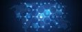 A digital world map is overlaid with a network of interconnected hexagons, each containing a padlock icon, symbolizing