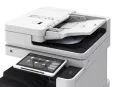 A white multifunction printer with a touchscreen display and an automatic document feeder is shown from a slightly