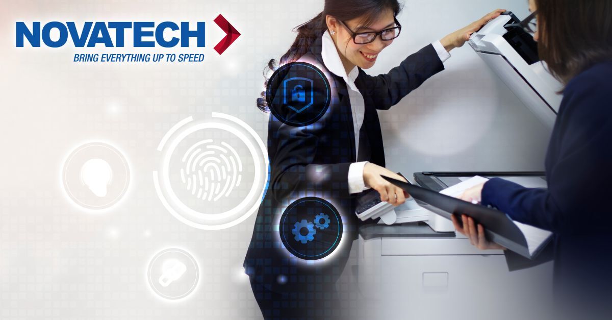 Two women are shown operating an office printer/scanner, with digital overlays highlighting concepts of security,