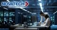Two IT professionals collaborate in a server room, with the Novatech logo prominently displayed, indicating a focus on