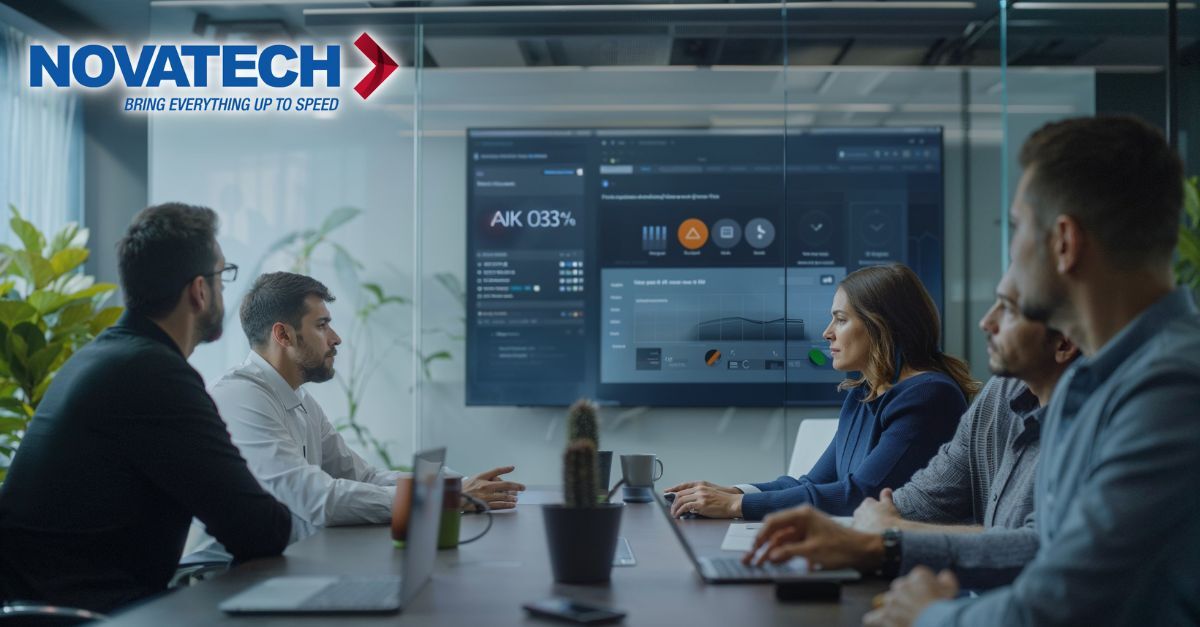 A group of professionals in a modern office are engaged in a meeting, with a large screen displaying data and analytics