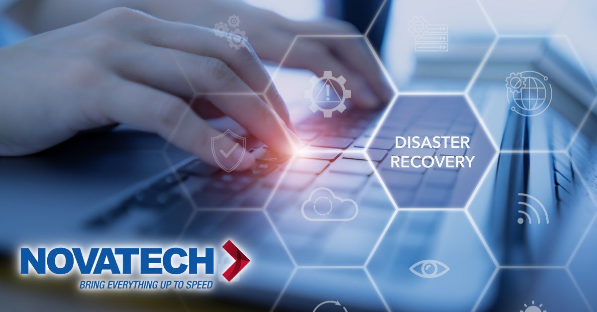 A person's hands are typing on a laptop keyboard, overlaid with a hexagonal grid of icons representing disaster