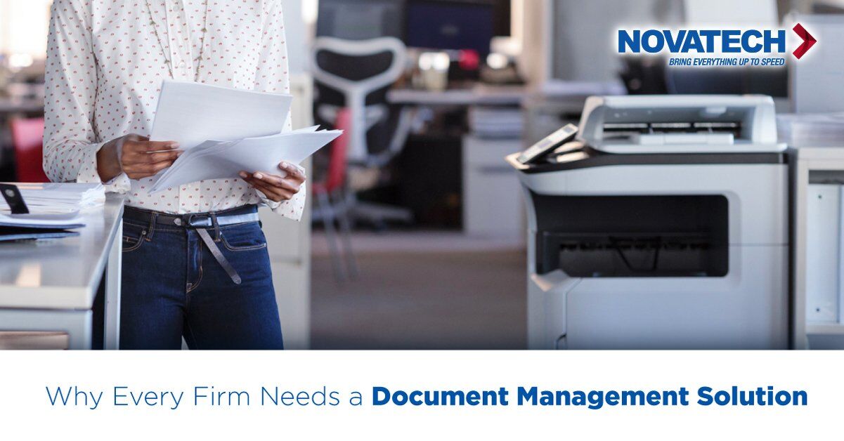 A person in a patterned shirt and jeans holds papers near a printer, with the Novatech logo and the text 