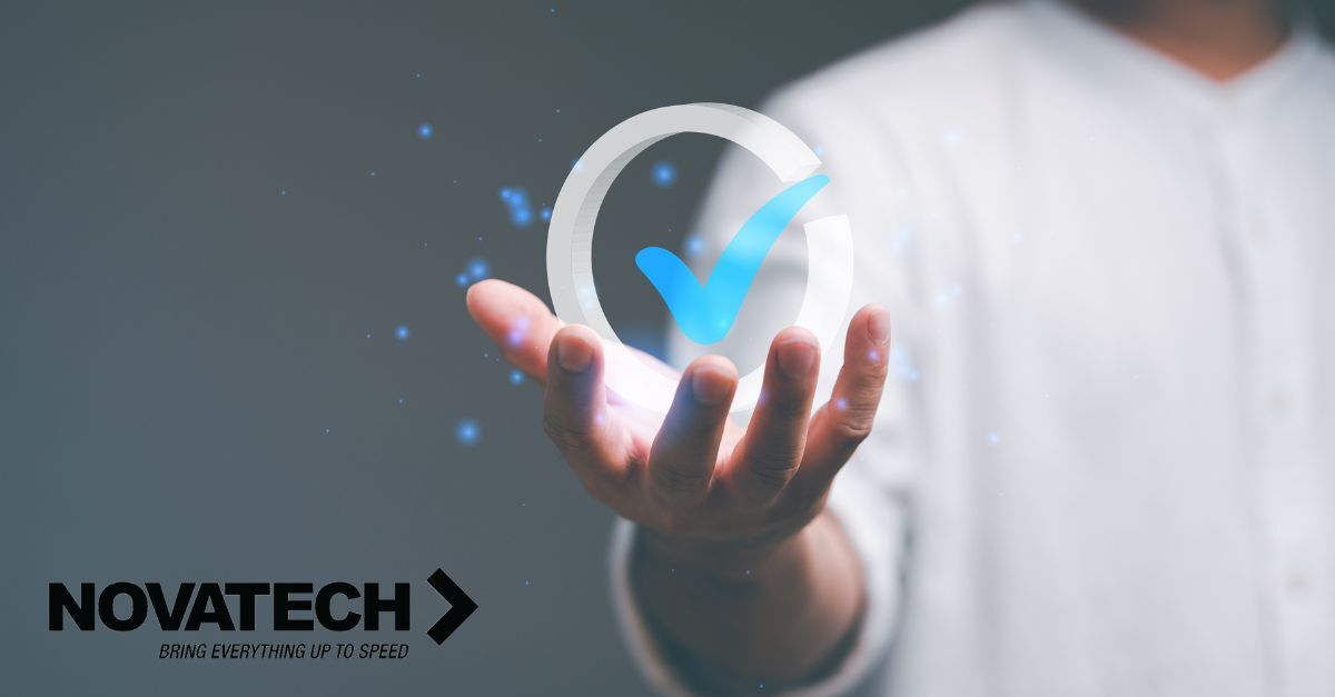 A person's hand holds a glowing checkmark within a circular frame, symbolizing completion or approval, with the