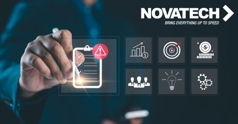 A person's hand is interacting with a digital interface displaying a checklist with an alert symbol, alongside icons