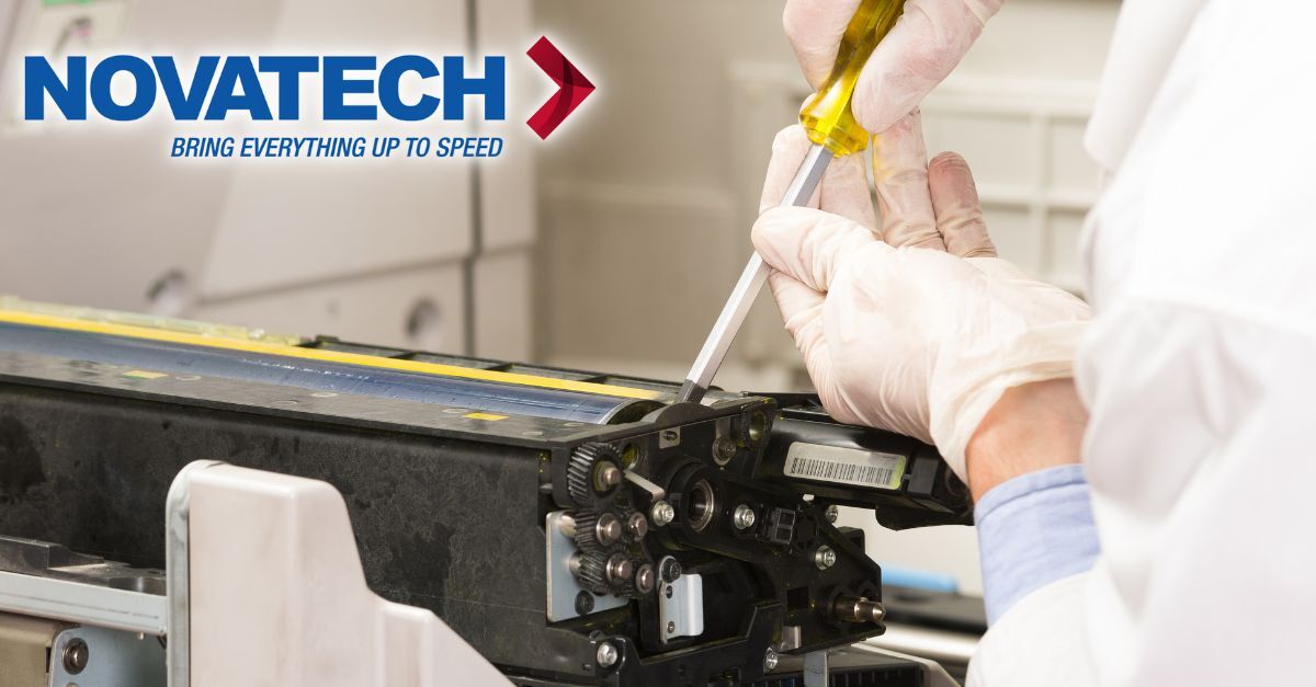 A technician in gloves uses a screwdriver to repair a printer toner cartridge, with the Novatech logo visible in the