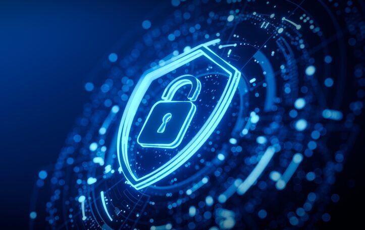 A glowing blue shield with an unlocked padlock symbolizes digital security against a backdrop of abstract data streams.