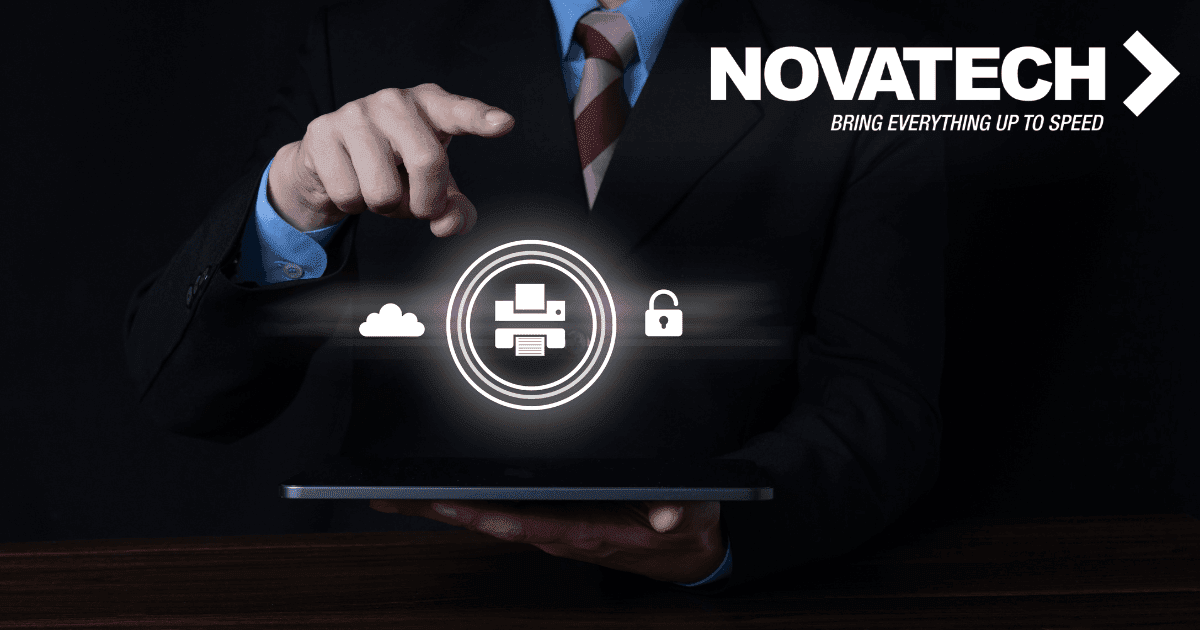 A businessman points to a tablet displaying icons representing cloud, printing, and security services, with the