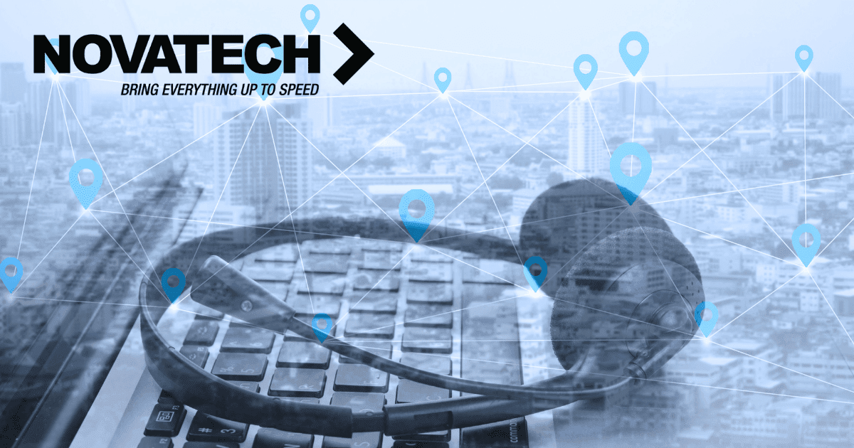 A laptop keyboard and headphones are overlaid with a network of location pins and lines against a city skyline,