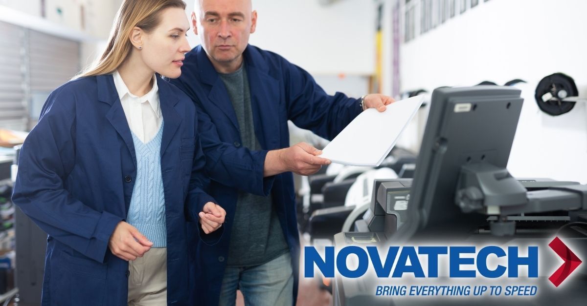Two people in blue lab coats examine documents near a printer, with the Novatech logo overlaid.
