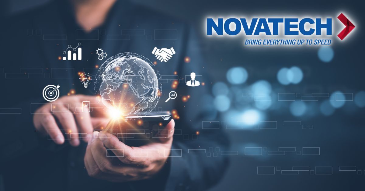 A person holds a smartphone emitting a digital globe surrounded by icons representing business, data, and global